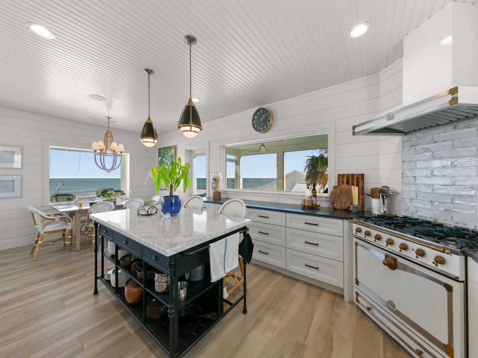 Kitchen + Dining Area - Table Seating for Six  + Breakfast Bar Seating for Two - Second Floor