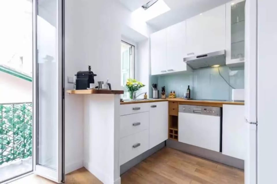 Design Apartment, Balcony, City View | Private kitchen | Espresso maker, coffee/tea maker, electric kettle