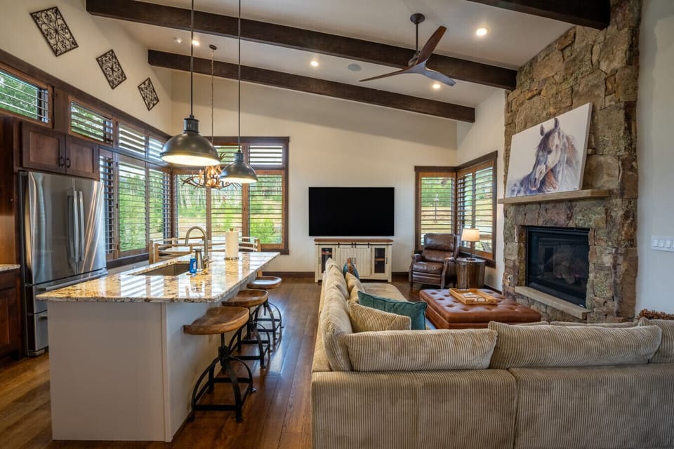 Upper Level - Open concept kitchen, dining and living areas