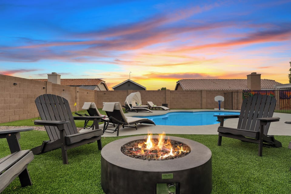 Backyard: Gather around the fire pit, where conversation flows as easily as the warmth of the flames.