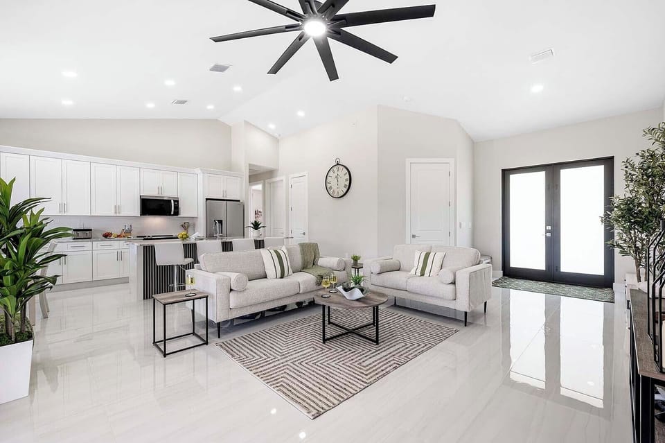 Living Room with Open Layout to Kitchen and Dining Space