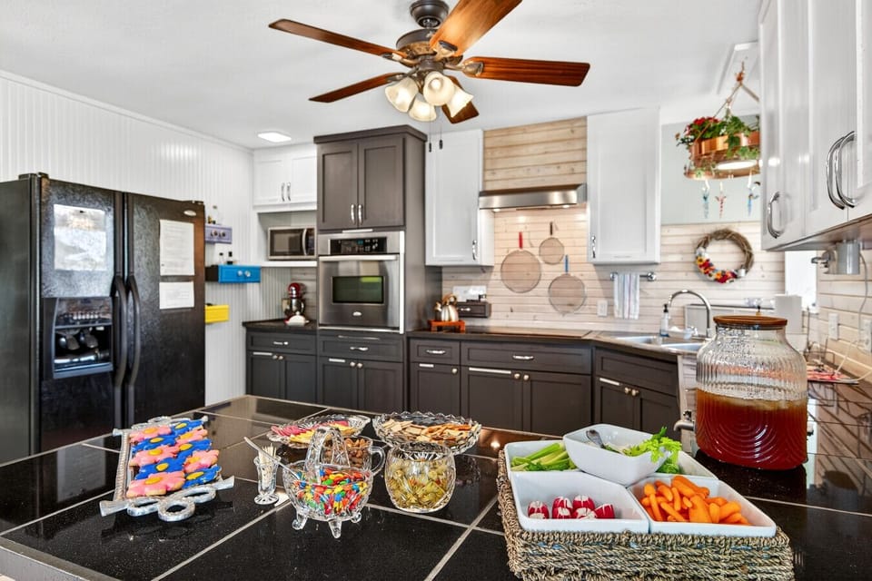 Spacious Kitchen | Stainless Steel Dishwasher, Island Prep Space & Mixer
