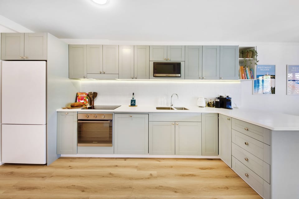 Lots of counter space to prepare meals & a dishwasher for clean up ease. 