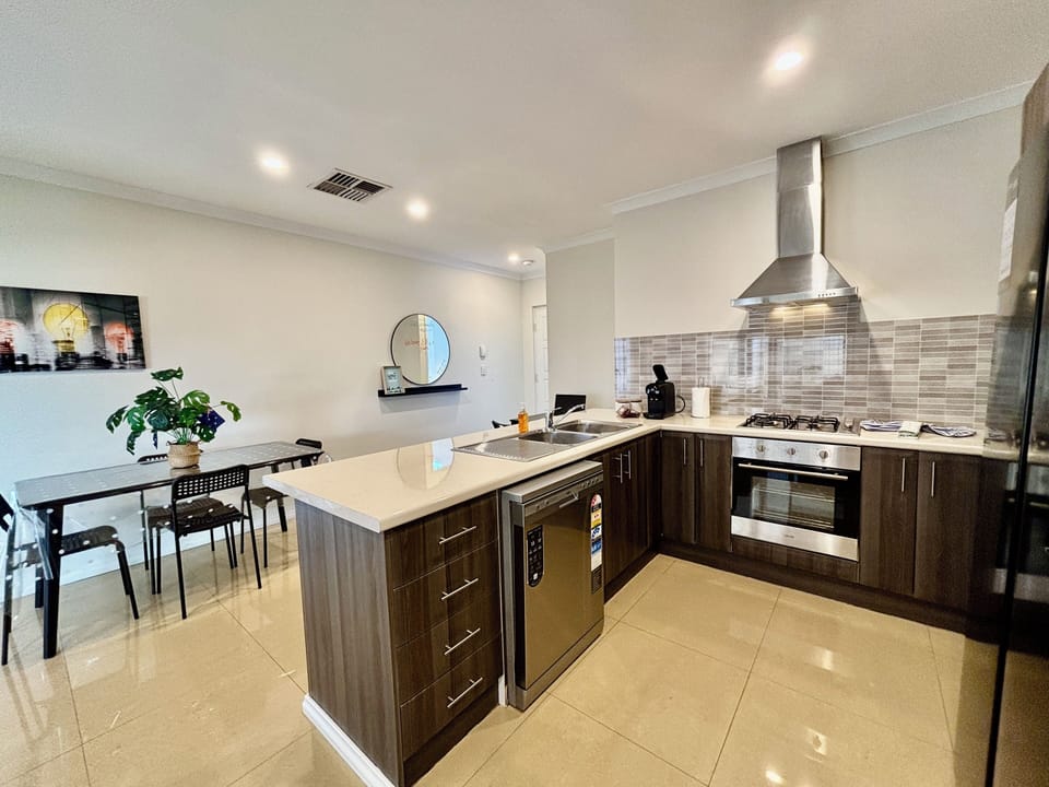 Full kitchen stocked with kitchen ware for your stay. Oh and a dishwasher for easy clean up. 