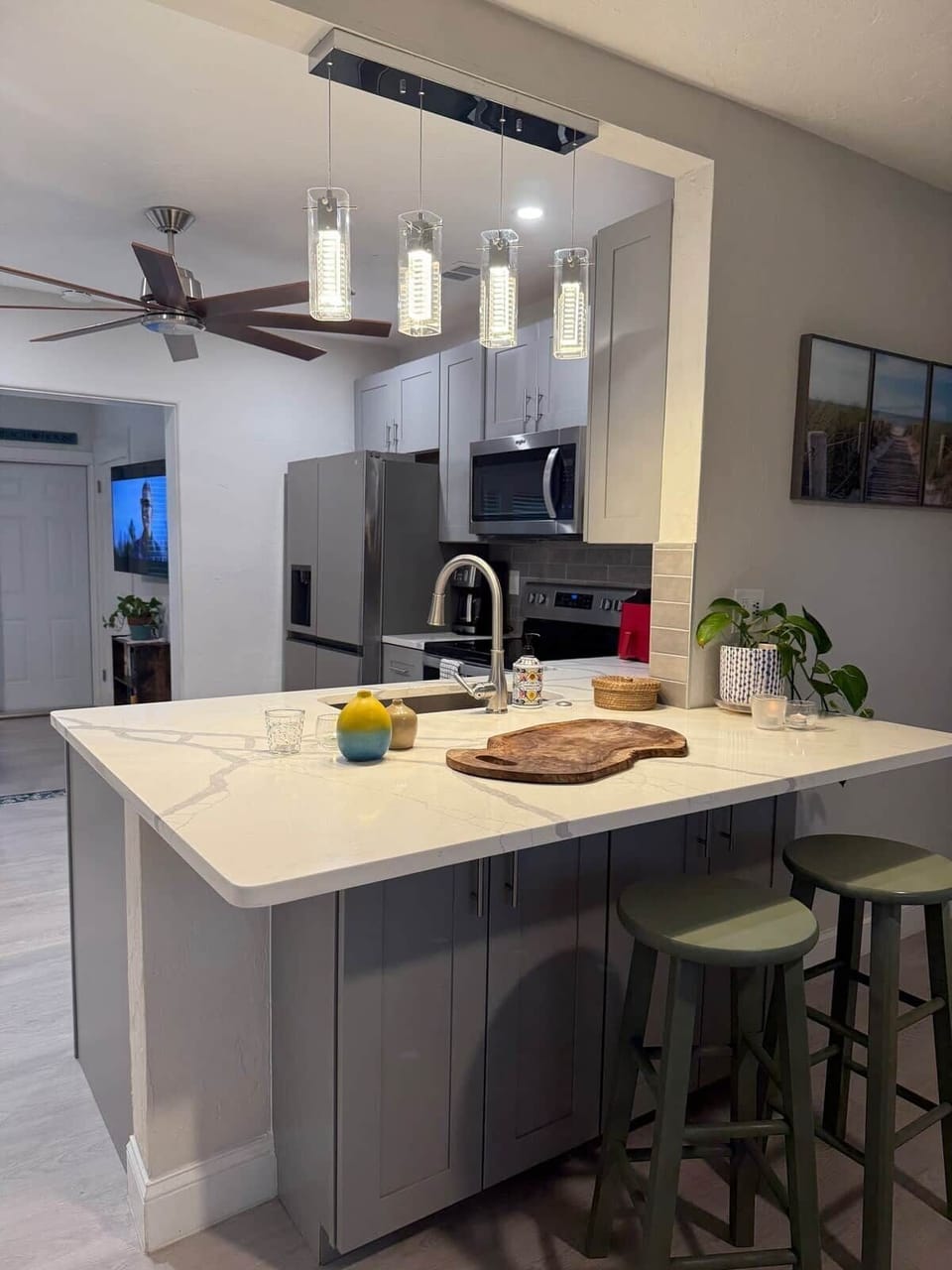There is a kitchen island with stools perfect for an informal breakfast!