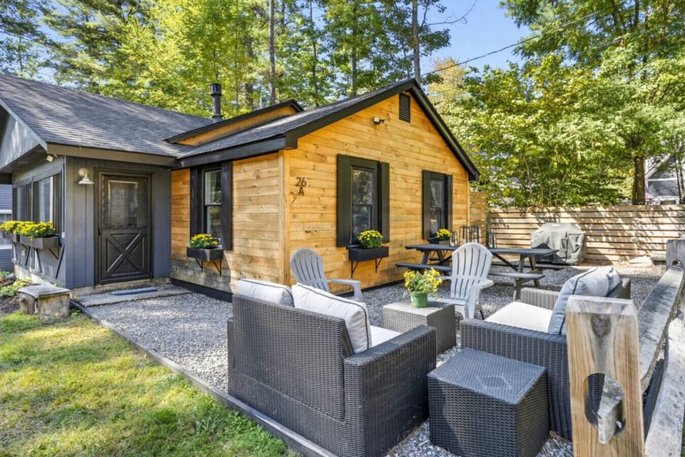 Charming exterior with a private patio to enjoy the fresh air.