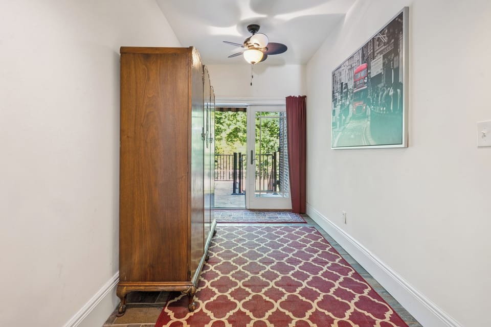 Back hallway that leads to the deck and parking lot