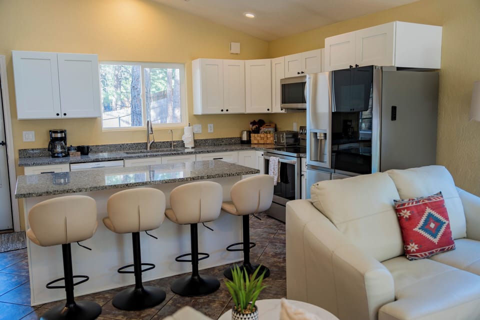Breakfast bar and full kitchen
