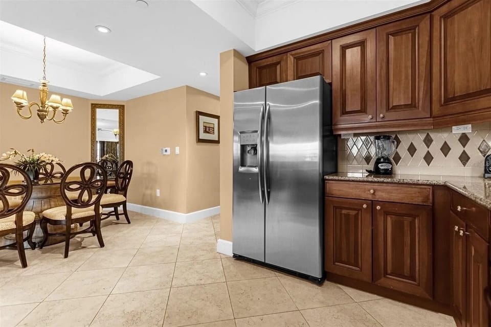 Fully Stocked Kitchen and Dining Area
