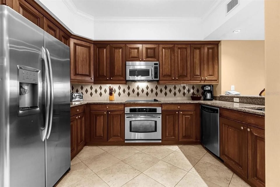 Fully Stocked Kitchen and Dining Area