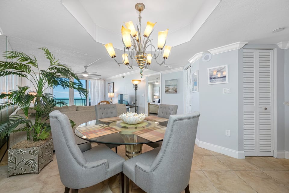 Comfortable seating under a modern chandelier.