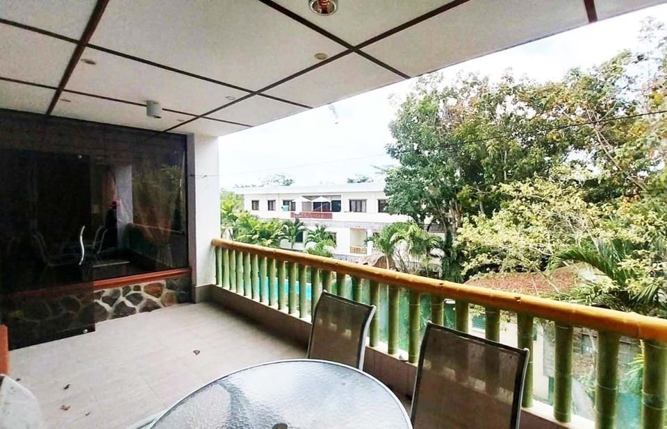 Balcony overlooking pool