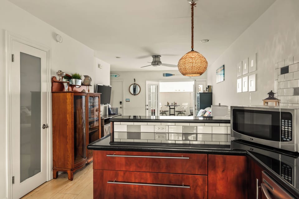 Kitchen overlooking bar area
