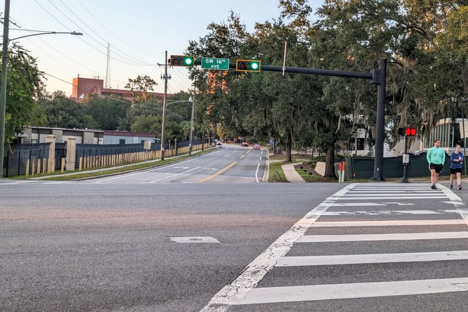 Cross at the signalized crosswalk, and one block walk to Shands UF Health & VA.