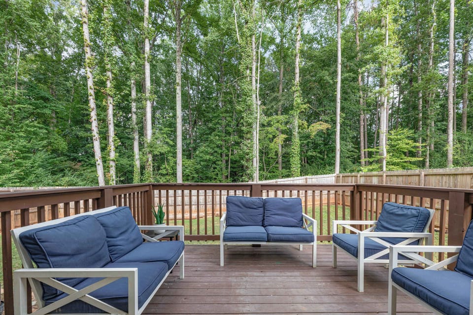 Enjoy a warm Charlotte evening in our fully fenced in backyard. Whether you are relaxing around the firepit, on the deck or in the hot tub, there's not a bad choice!