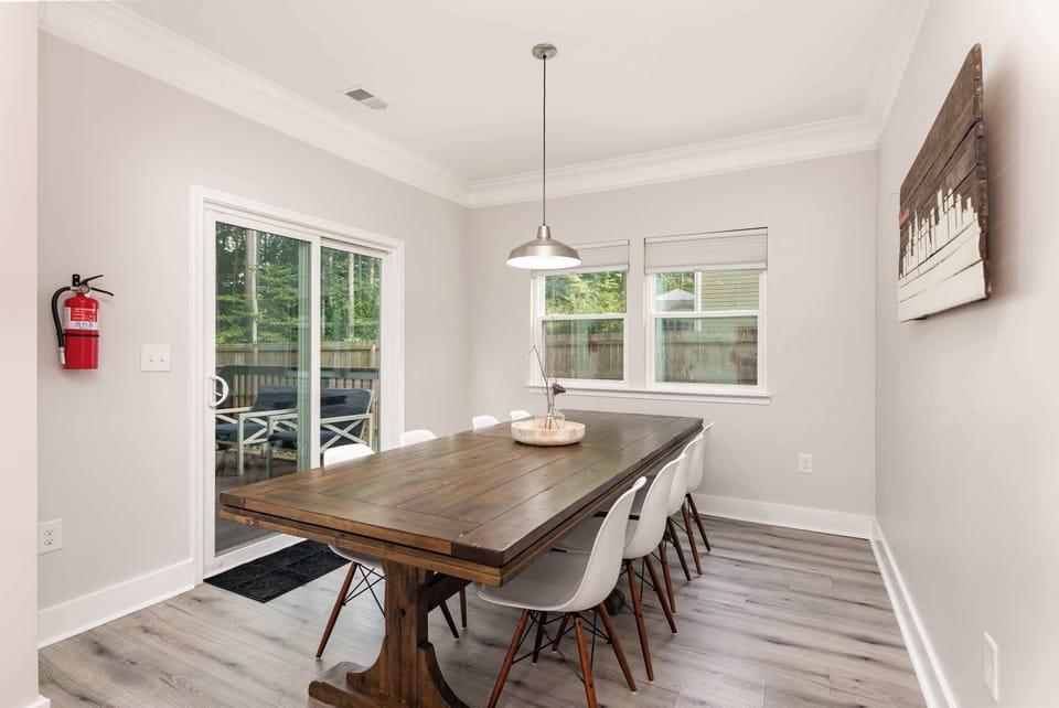 The kitchen seamlessly flows into the dining room and has seating for 8.