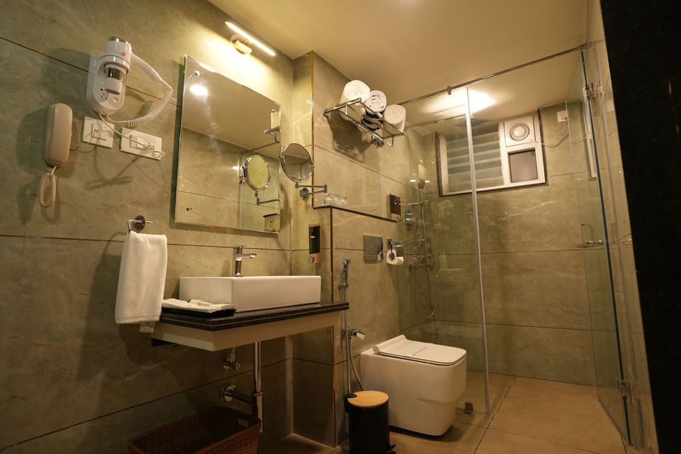 Classic Room | Bathroom | Hair dryer, slippers, towels, soap