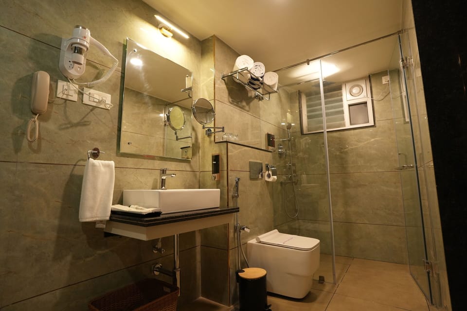 Classic Room | Bathroom | Hair dryer, slippers, towels, soap