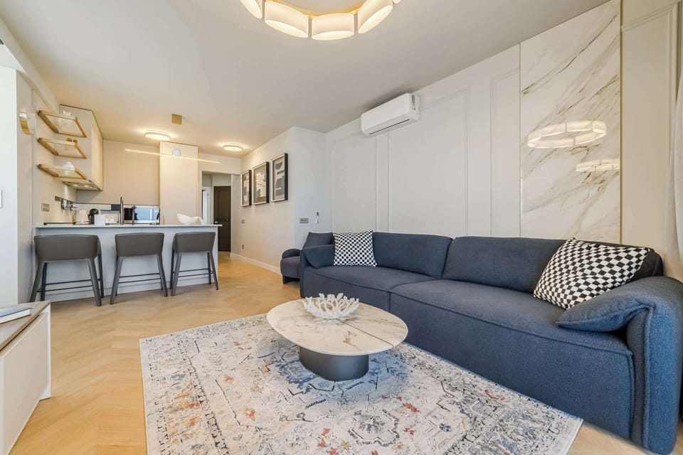 Stylish Living Area with Plush Seating – Perfect for Cozy Evenings in Your Luxury Suite