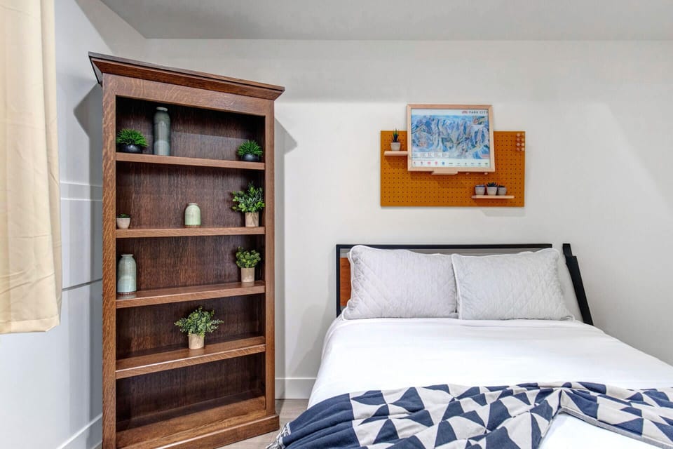 Wasatch Springs 1107: Full bedroom with attached half bathroom and desk