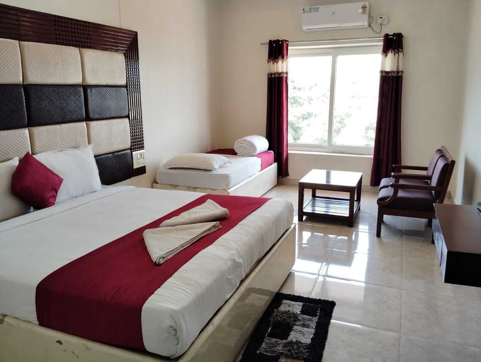 Deluxe Triple Room, Valley View | Soundproofing, iron/ironing board