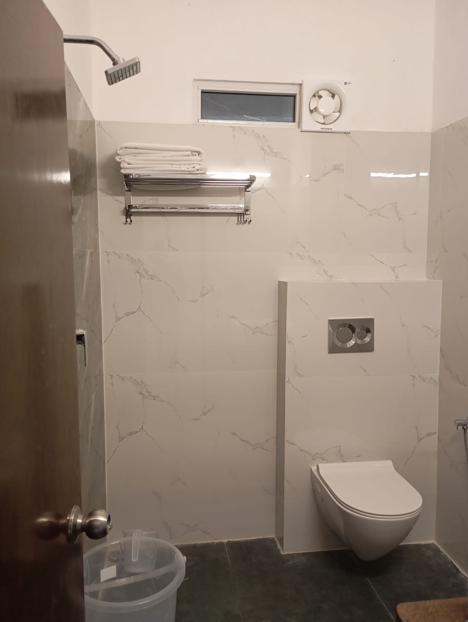 Comfort Room, City View | Bathroom | Shower, slippers, towels, soap