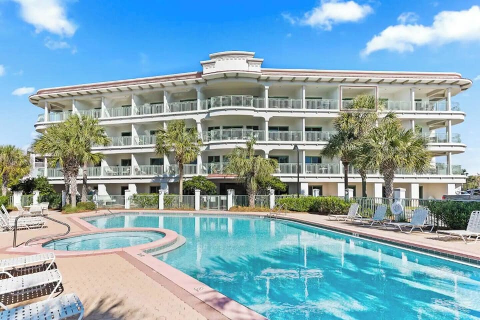 Unwind and rejuvenate with our private pool and hot tub, conveniently located just outside your door.  Spend your days relaxing by the pool, reading a book, or exploring the beautiful beach.