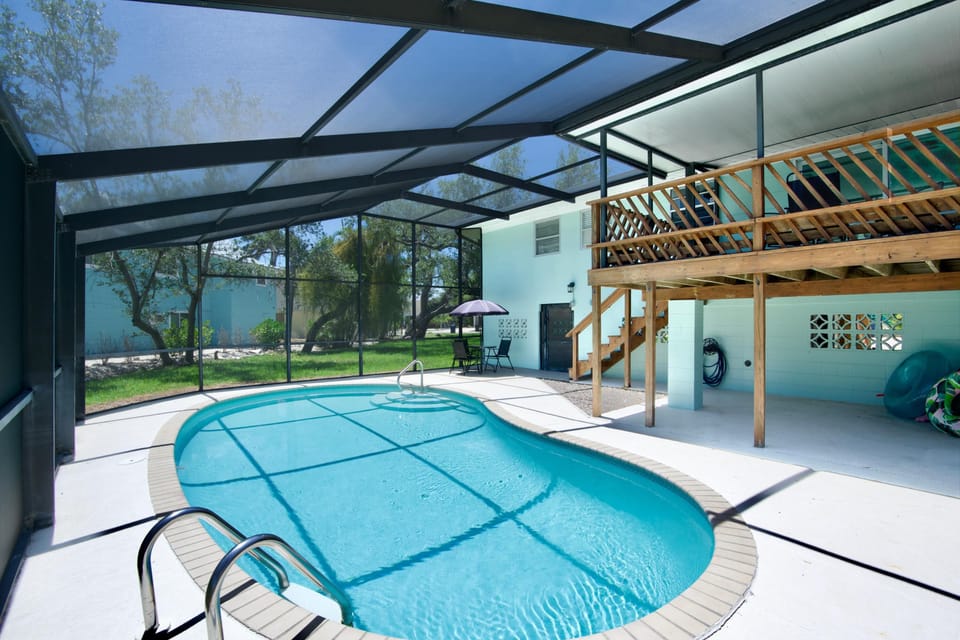 House, Multiple Beds (Seashell Blue) | Pool | A heated pool