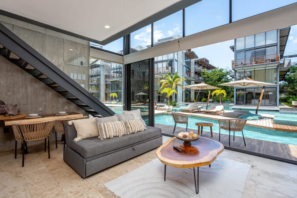 Livingroom view of pool. 
