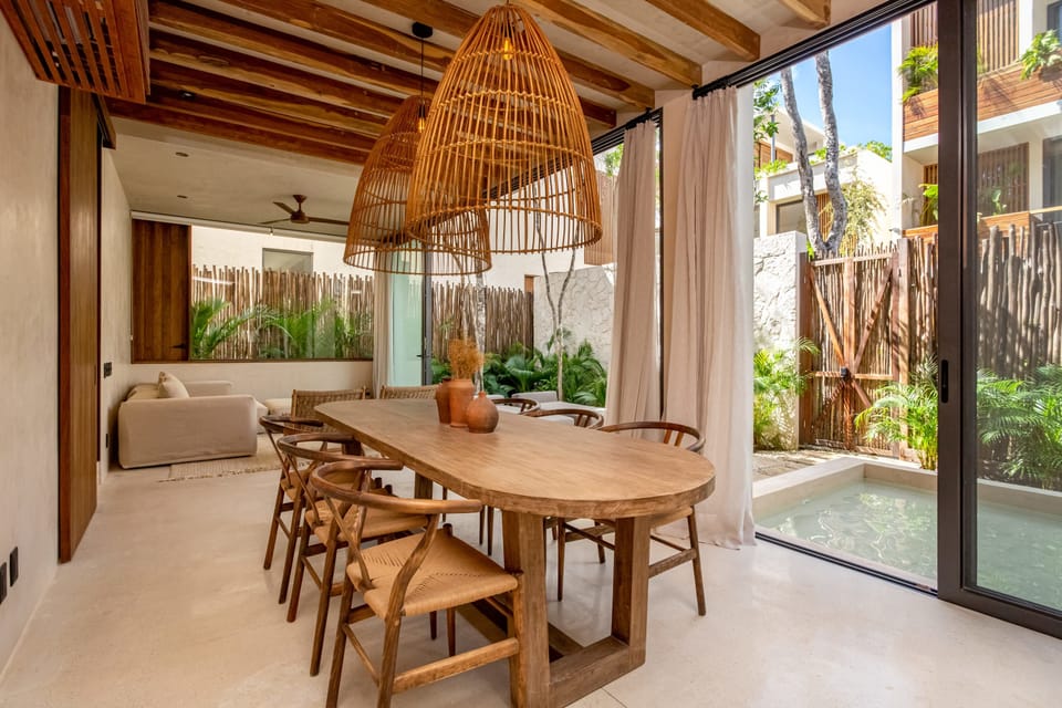 The dining area and living room are perfect for large groups, offering a comfortable and welcoming space.