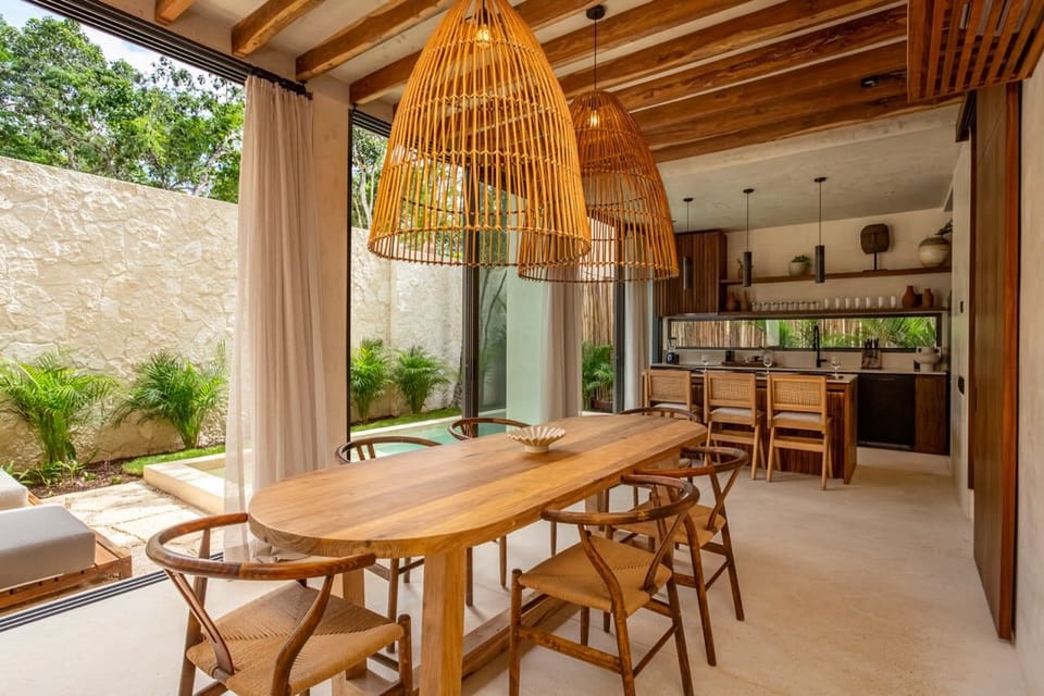 Indoor dining area with a table and six chairs, perfect for enjoying meals in a comfortable and cozy setting