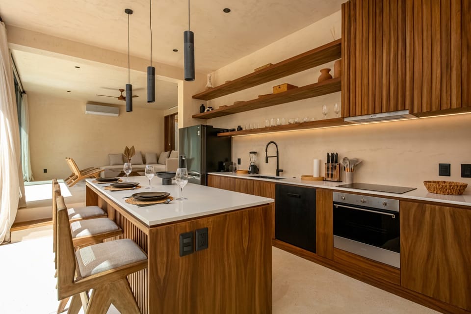 The kitchen features a breakfast bar.