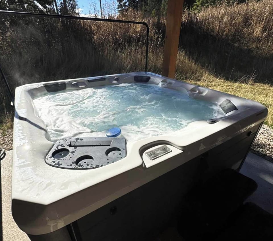 Unwind in the private hot tub while surrounded by peaceful Black Hills scenery. Perfect for soothing sore muscles after a day of exploring or enjoying a quiet evening under the stars.