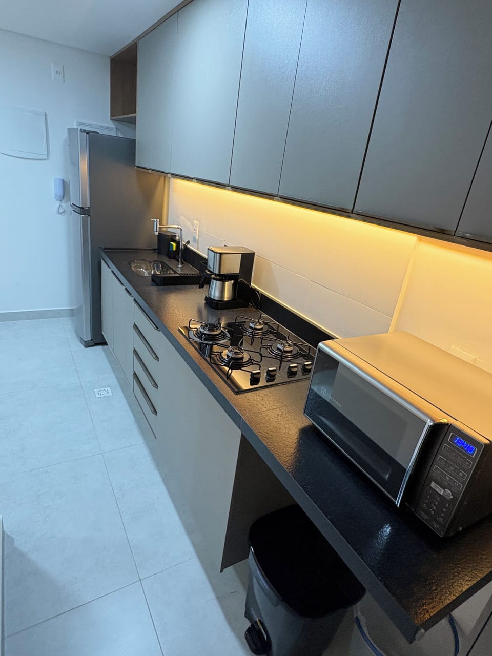 Apartment | Private kitchen | Fridge, microwave, stovetop, cookware/dishes/utensils
