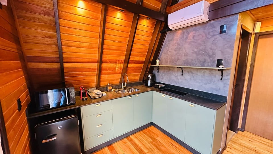 Deluxe Quadruple Room, Patio | Private kitchen