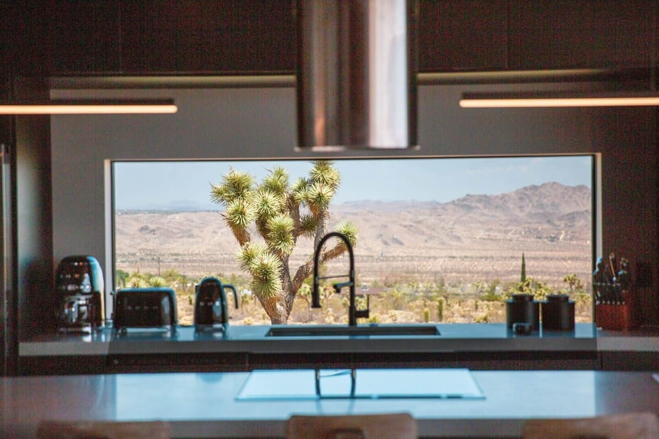 Modern kitchen with desert views.