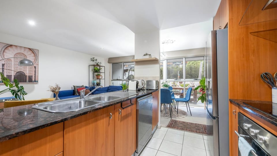 Open-plan kitchen and dining designed for comfort and style