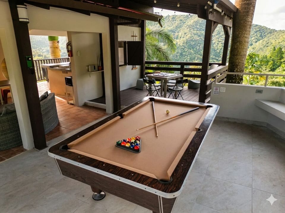 Relax and play. Billiard table and dominoes area for endless family fun.