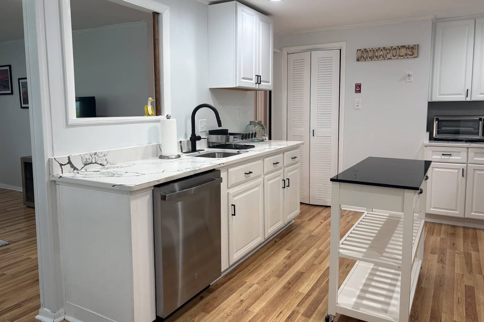 Newly-remodeled kitchen includes new appliances.