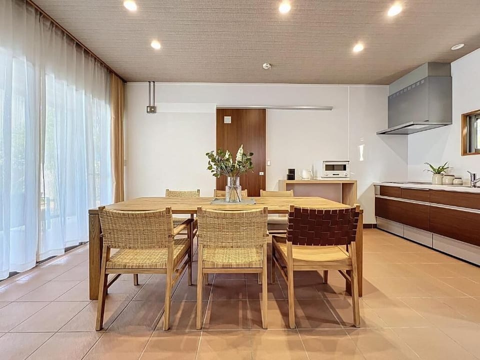 Villa, Sea View | Living area | 50-inch flat-screen TV with cable channels