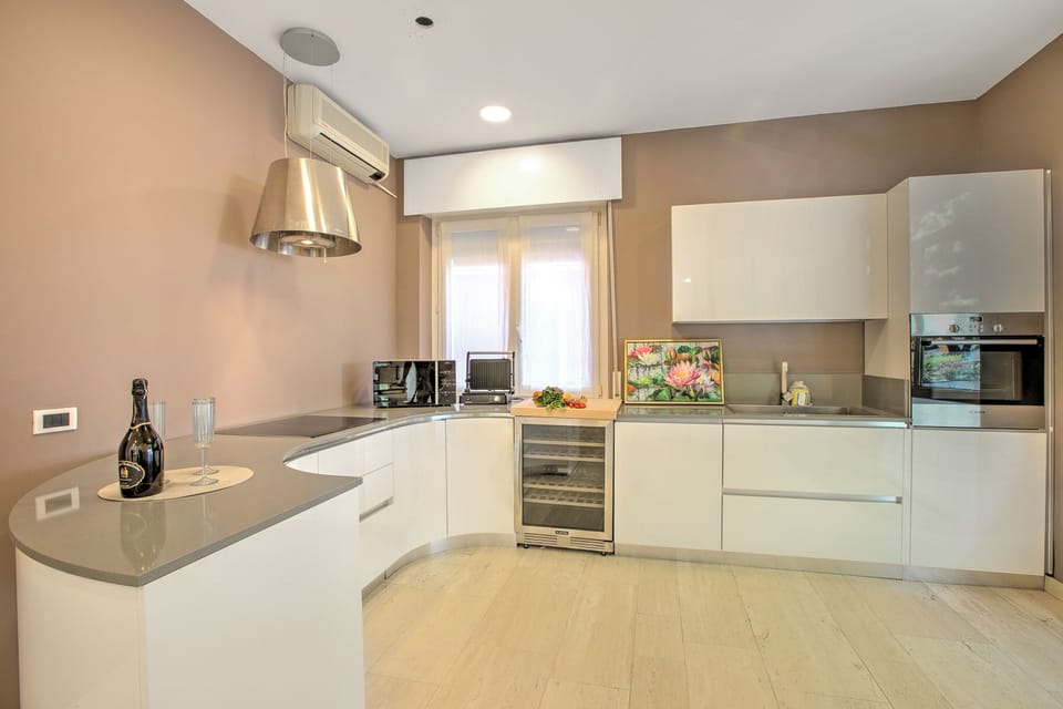 Family Apartment, Multiple Bedrooms (Residenza Albachiara) | Private kitchen | Fridge, microwave, oven, stovetop