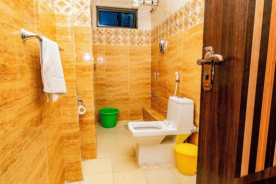 Shower, slippers, towels, soap