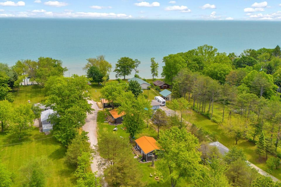 Cottages, trees, and Lake Huron all in one epic aerial. It’s your own little lakeside village.