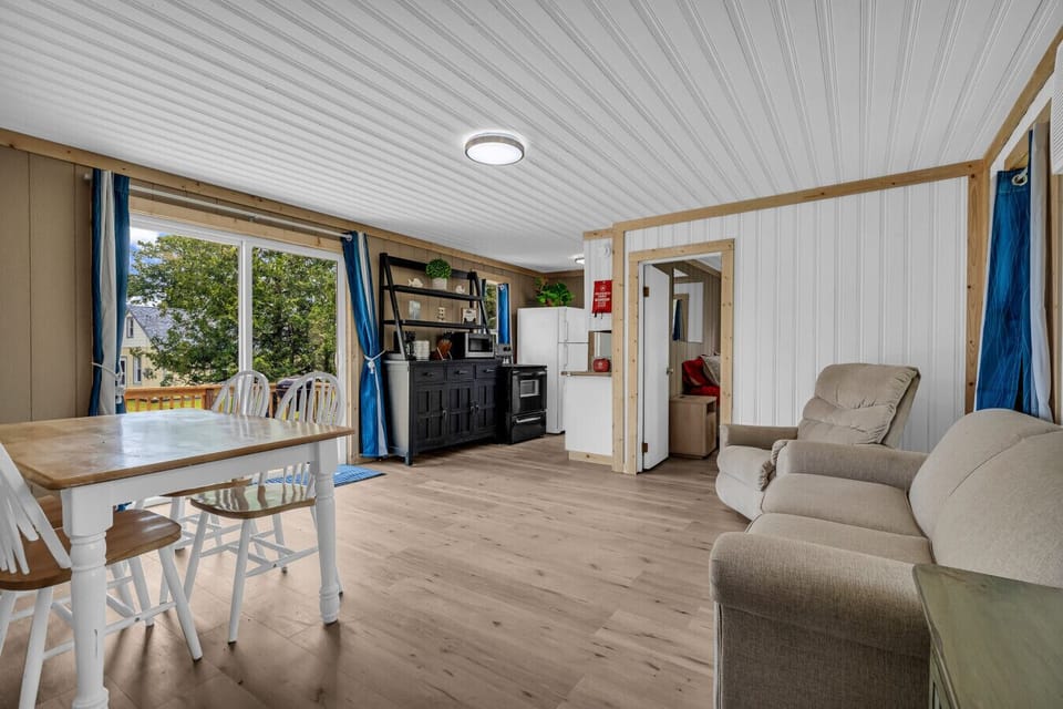 Cozy living + dining combo. Kick back after the beach, share a meal, or sink into the sofa for a lazy afternoon.