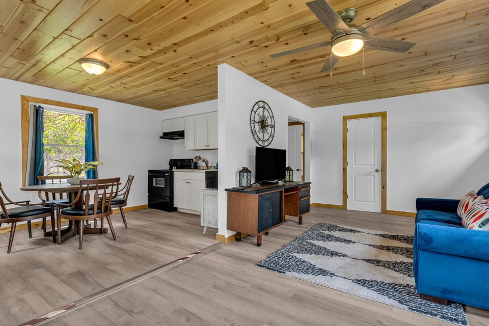 The open layout flows from kitchen to living room, perfect for mingling, munching, and memory-making.