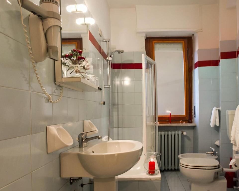 Free toiletries, hair dryer, slippers, towels