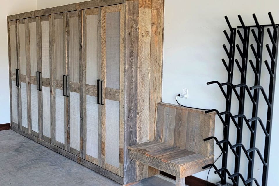 Stash skis and gear neatly with dedicated racks and bench.