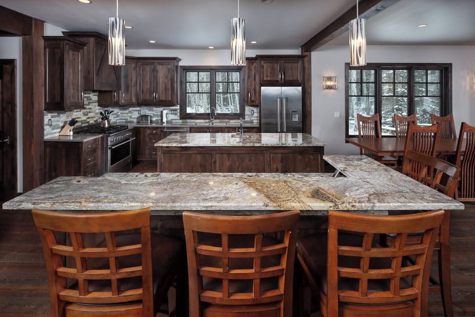 Gather around the stone island for effortless shared meals.