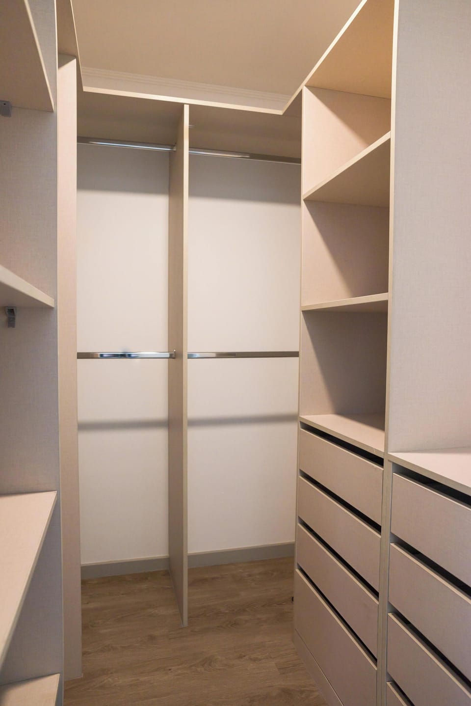 Spacious walk-in closet with ample storage for a clutter-free stay.
