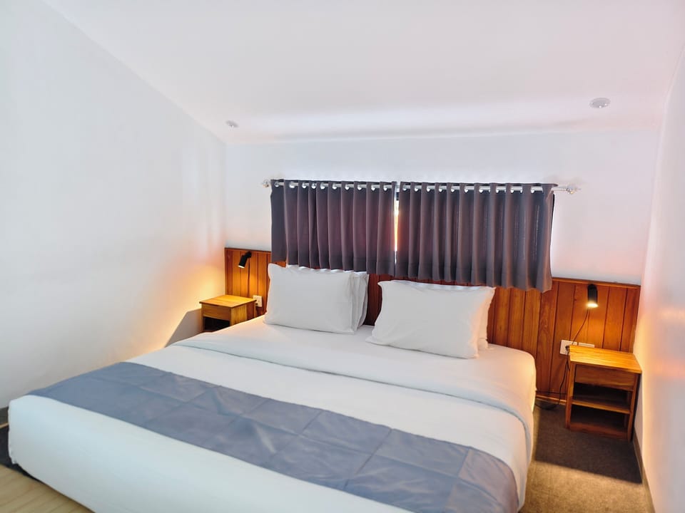 Apartment, Balcony, Pool View | In-room safe, desk, blackout drapes, iron/ironing board